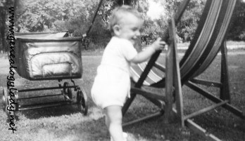 1943 - David playing with lawn chair